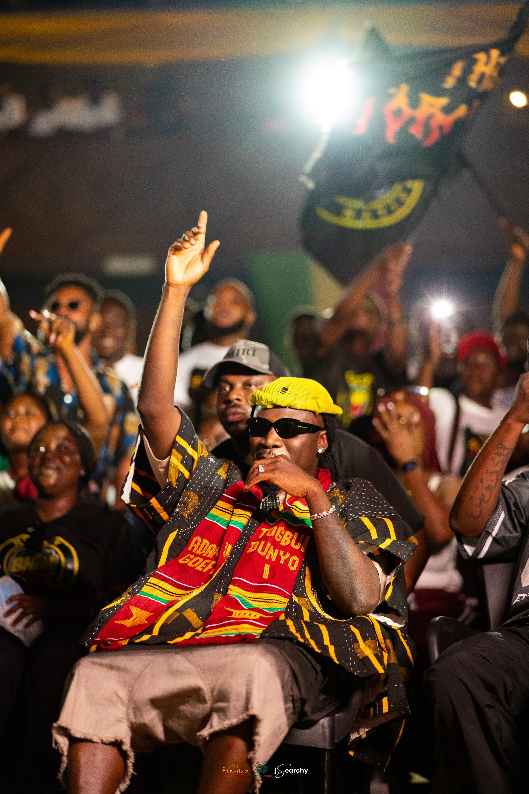 Stonebwoy performing in the Adaklu kente at the Torcher Experience