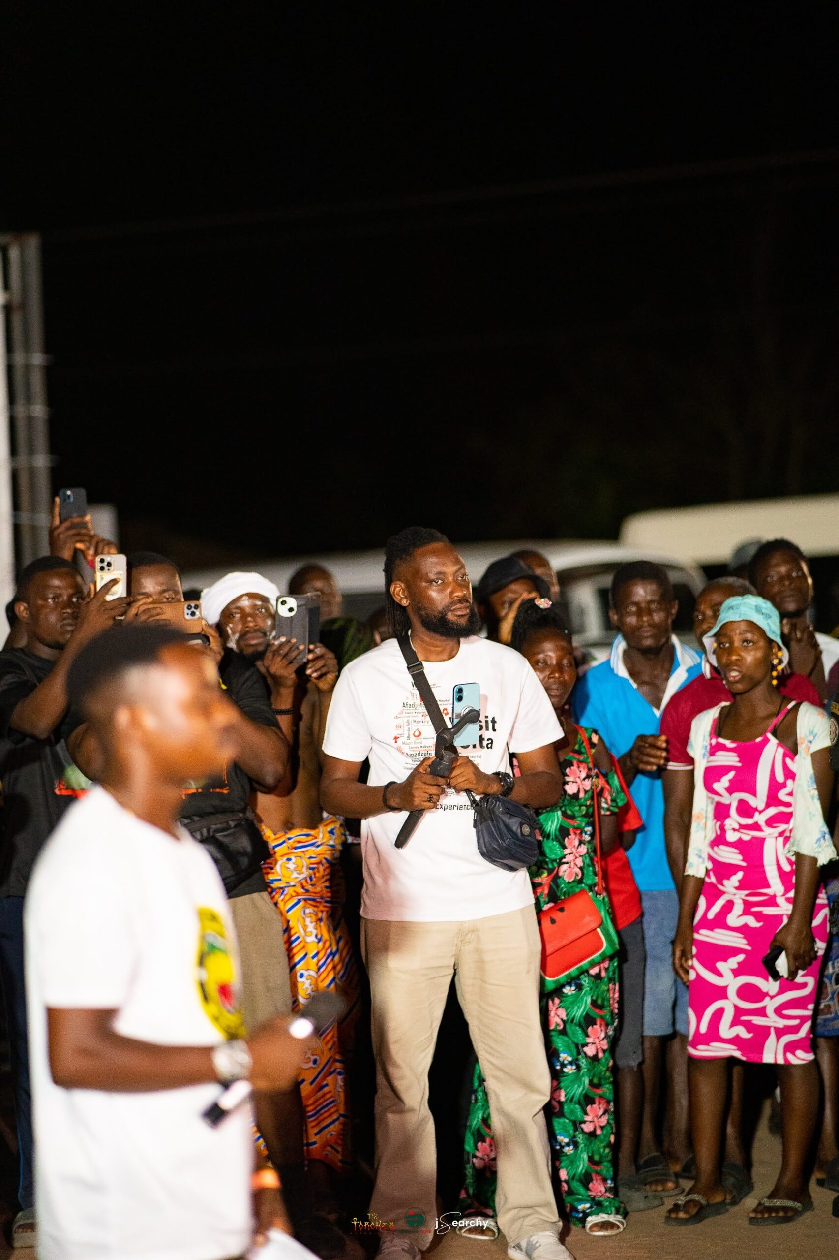 Crowd cheering during the Torcher Experience night show